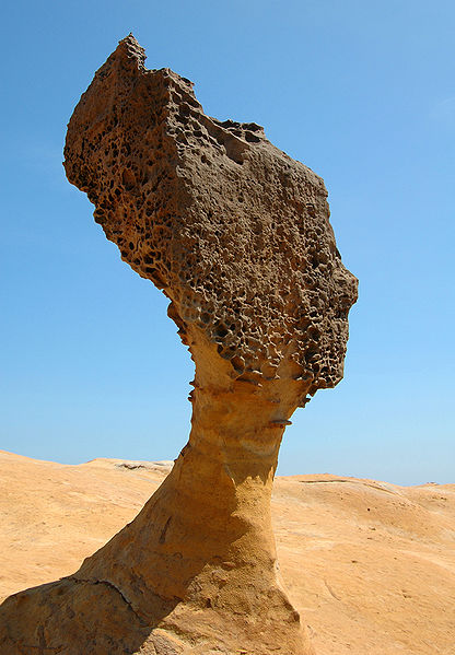 Queen`s Head at Wanli, Taiwan carved out of the sedimentary rock by wind and water is located in air sign Libra with water sign Pisces photo: Alton.arts license: ccbysa3.0  