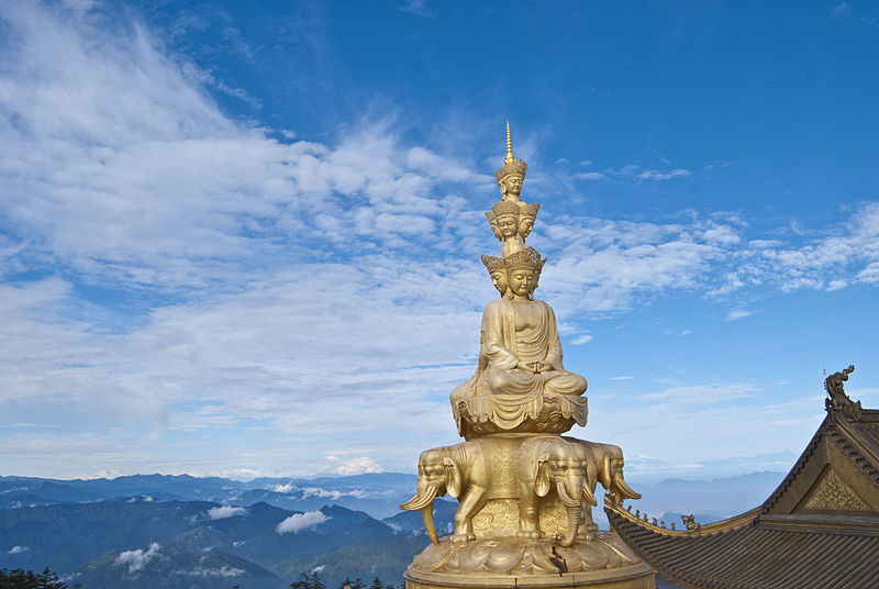 Golden Samanthabhadra statue on top of the temple on Mount Emei located in Scorpio with Aries photo: Cs california ccbysa3.0