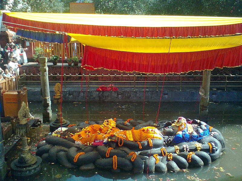 Budhanilkantha open air shrine - Vishnu floating in a water tank photo: जनक राज भट्ट, ccbysa3.0