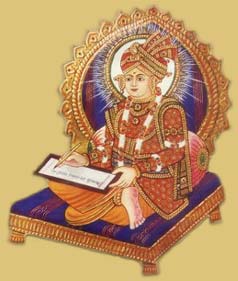 Swaminarayan writing the Shikshapatri. image: Around The Globe, GNU/FDL